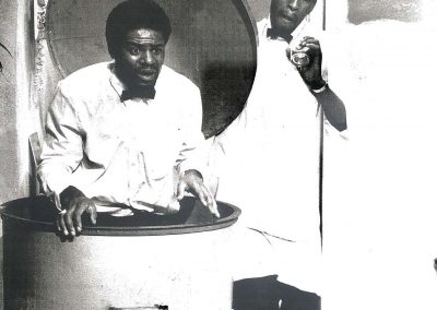 L-R: Tony Armatrading and Bob Phillips in SMILE ORANGE written and directed by Trevor Rhone, 1985